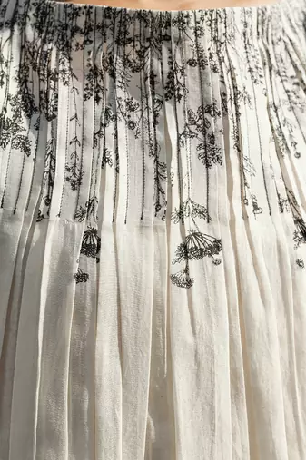 Ivory belladonna pleated neck dress