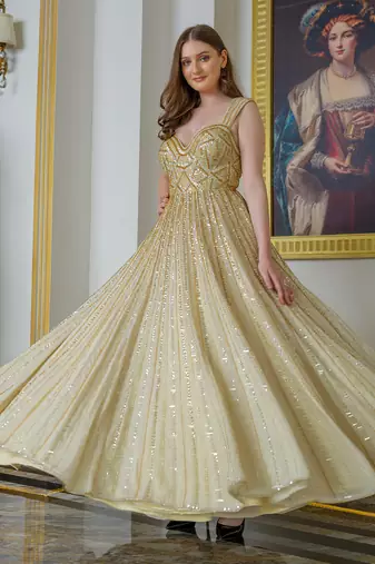Gold tissue silk flared gown