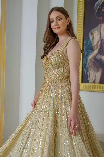 Gold tissue silk flared gown