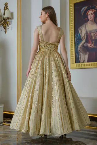 Gold tissue silk flared gown