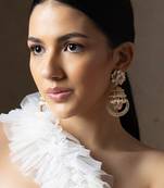 Gold polki and pearl jhumka earrings