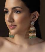 Gold polki jhumka earrings with jade tumbles