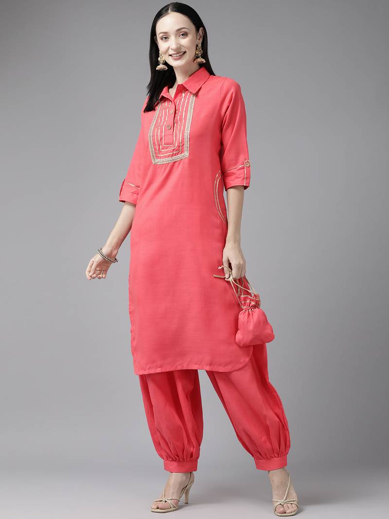 Aarika womens gajri colour rayon solid kurti & salwar set