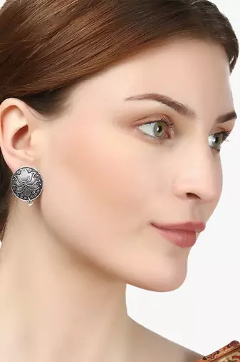 Look like silver circular shaped lotus studs