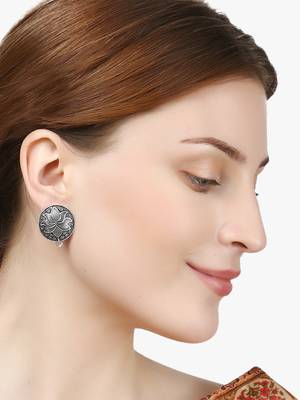 Look like silver circular shaped lotus studs 3
