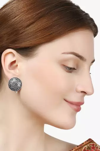 Look like silver circular shaped lotus studs