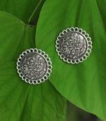 Look like silver circular shaped studs