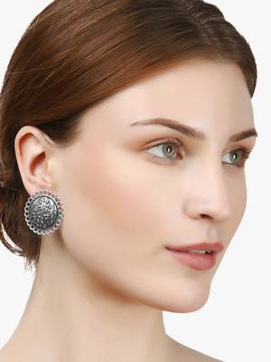 Look like silver circular shaped studs 5