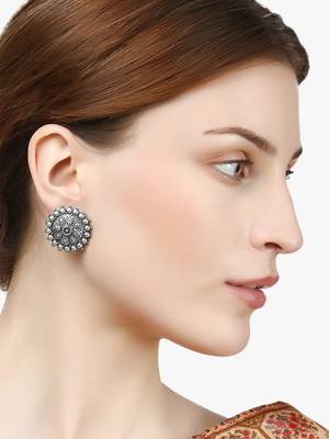 Look like silver circular shaped studs 3