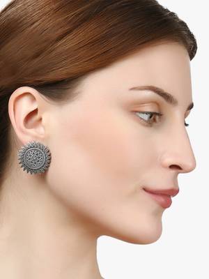 Look like silver circular shaped studs 5