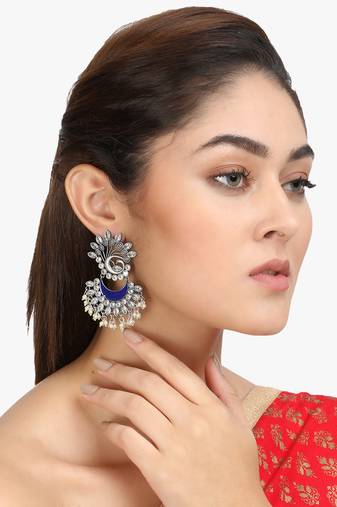 Women silver plated green stone-studded peacock shaped earing