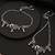 Set of 2 silver-plated artificial stones studded peacock shaped adjustable anklets