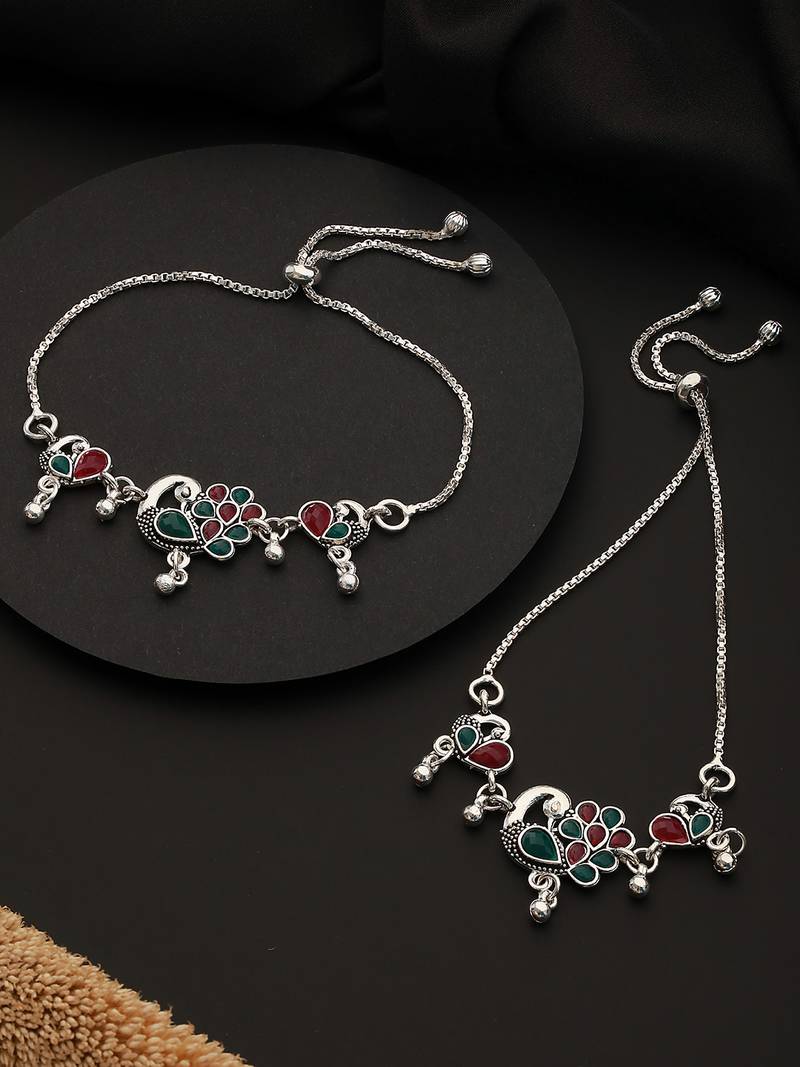 Set of 2 silver-plated artificial stones studded peacock shaped adjustable anklets