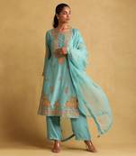 Turquoise embroidered tussar silk kurta set