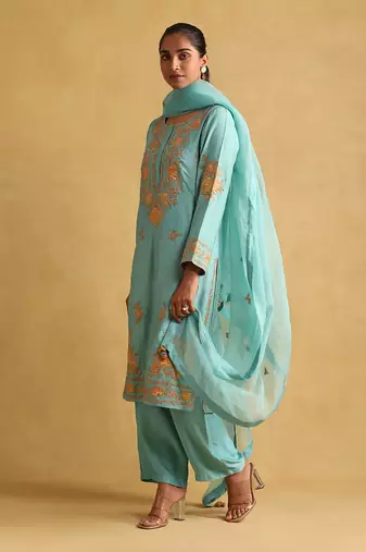 Turquoise embroidered tussar silk kurta set