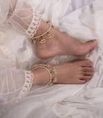 Green kundan and pearl anklets