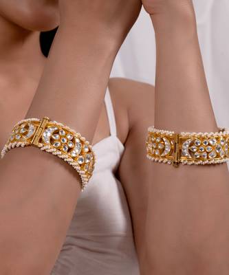 White jadau kundan and polki bangles 1