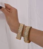 White jadau polki and kundan bangles