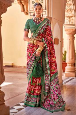 Red silk patola print saree with blouse 1