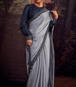 Grey fancy fabric plain saree with swarovski diamond work lace border saree with blouse