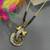 Gold plated short mangalsutra gold & ad ganesha pendant gold & black beads chain designs
