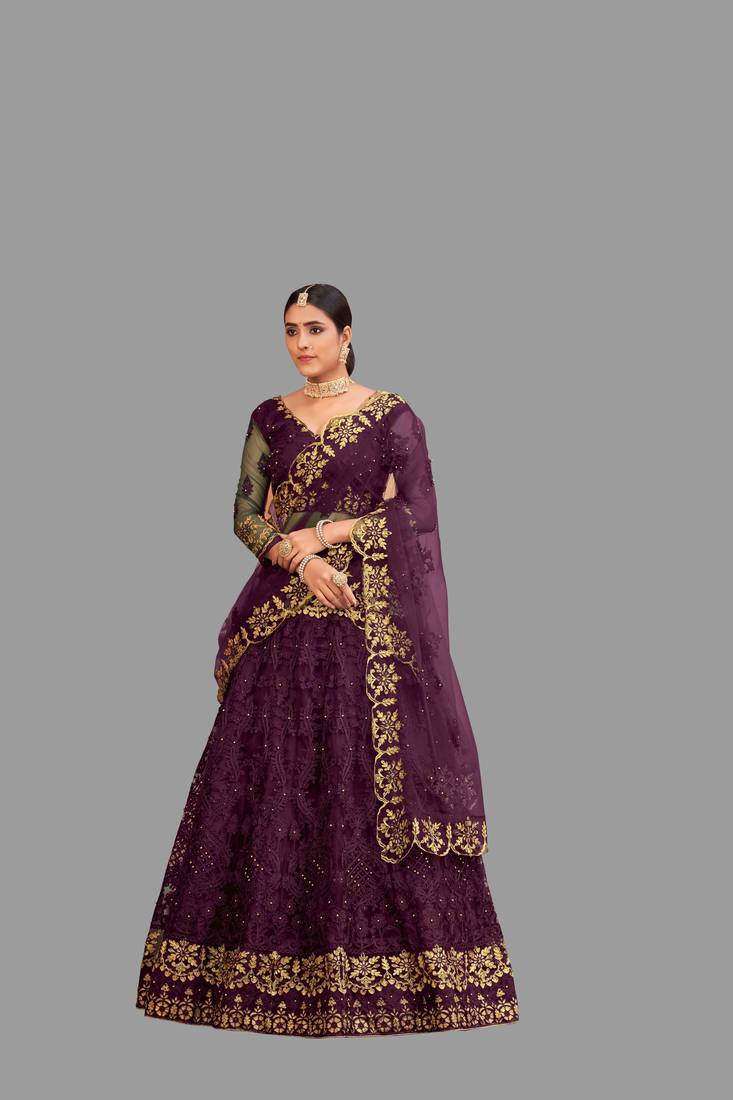 Adorable Purple Heavy Net Embroidered Bridal Lehenga Choli