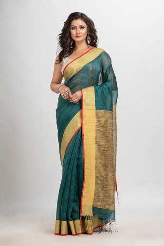 Dark teal silk blend linen with solid border jamdani saree
