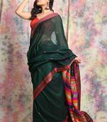 Deep green cotton handloom saree with thread worked border and pallu
