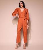 Rust ruffle jumpsuit by LABEL