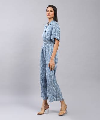 Blue floral print denim jumpsuit by LABEL 2