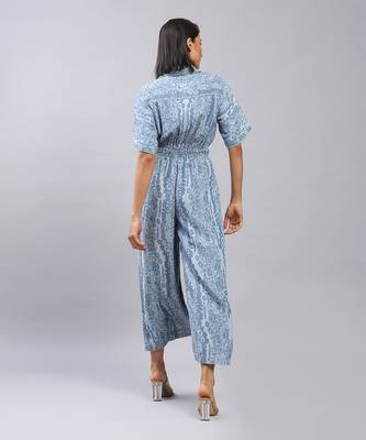 Blue floral print denim jumpsuit by LABEL 4