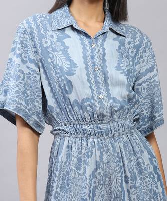 Blue floral print denim jumpsuit by LABEL 5
