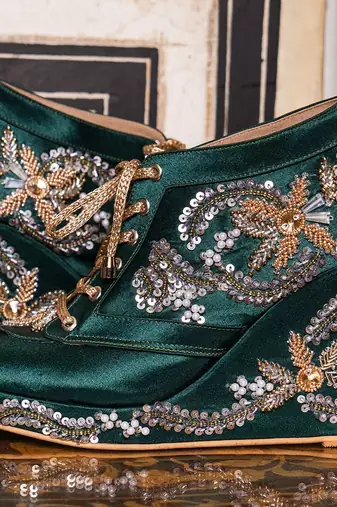 Dark green hand embroidery wedges