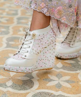 White hand embroidery wedges 1