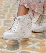 White hand embroidery wedges