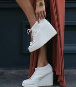 White hand made wedges