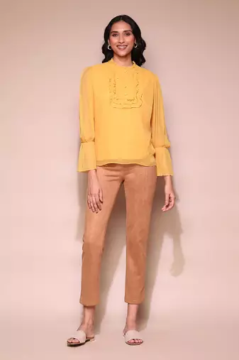 Mustard ruffle top by LABEL