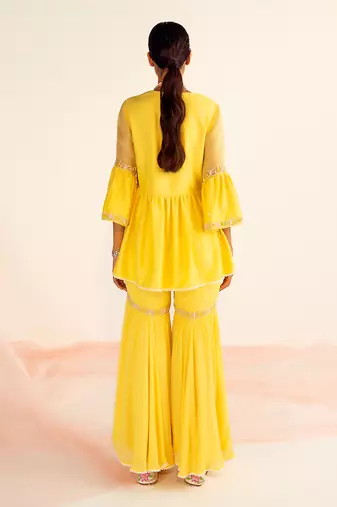 Yellow peplum georgette sharara set