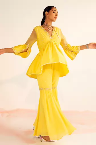 Yellow peplum georgette sharara set