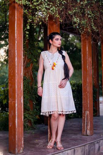 Designer Off White Colour Kurti With Fancy Resham Embroidery Work And Girlish Looks