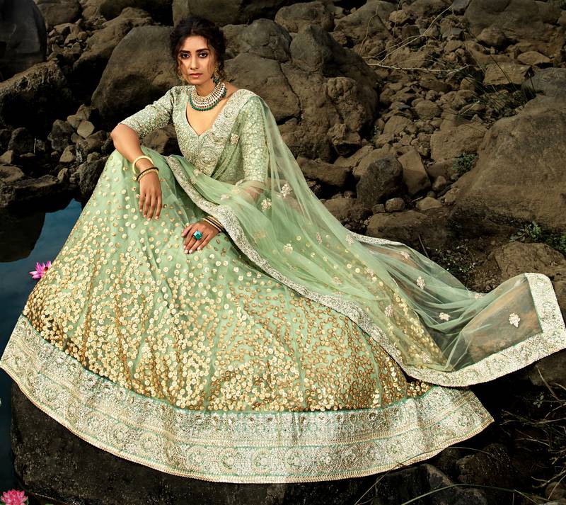 Seductive Green Dori And Sequins Embroidered Net Lehenga Choli For Bride