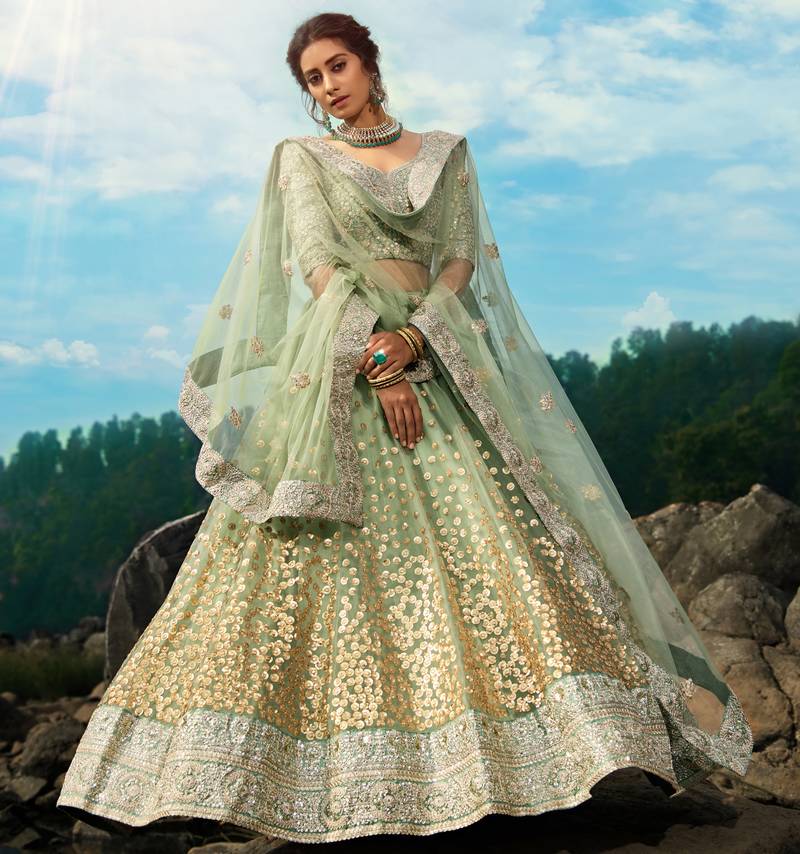 Seductive Green Dori And Sequins Embroidered Net Lehenga Choli For Bride