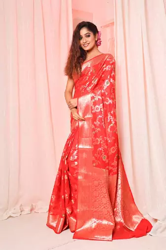 Red soft silk saree with allover zari and mina work