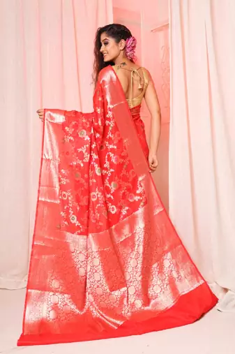 Red soft silk saree with allover zari and mina work