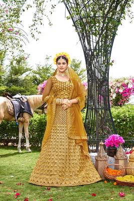 Ethnic Wedding Wear Net Fabric Mustard Colour Lehenga Set 1