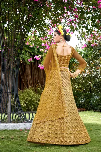 Ethnic Wedding Wear Net Fabric Mustard Colour Lehenga Set