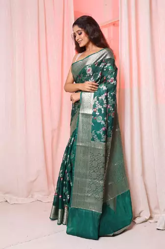 Bottle green soft silk saree with allover zari and mina work