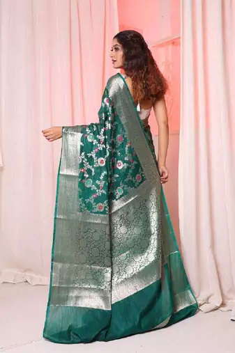 Bottle green soft silk saree with allover zari and mina work