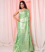 Light green soft silk saree with allover zari and mina work