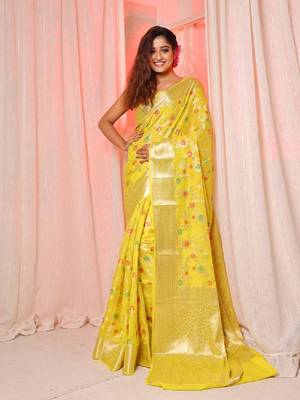Yellow soft silk saree with allover zari and mina work 1